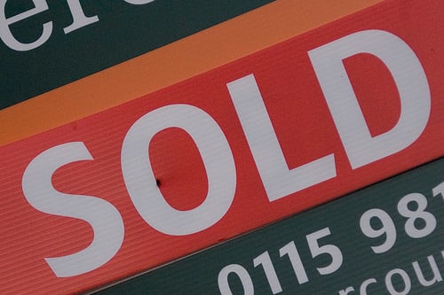 red sold sign by Diana Parkhouse, on Flickr